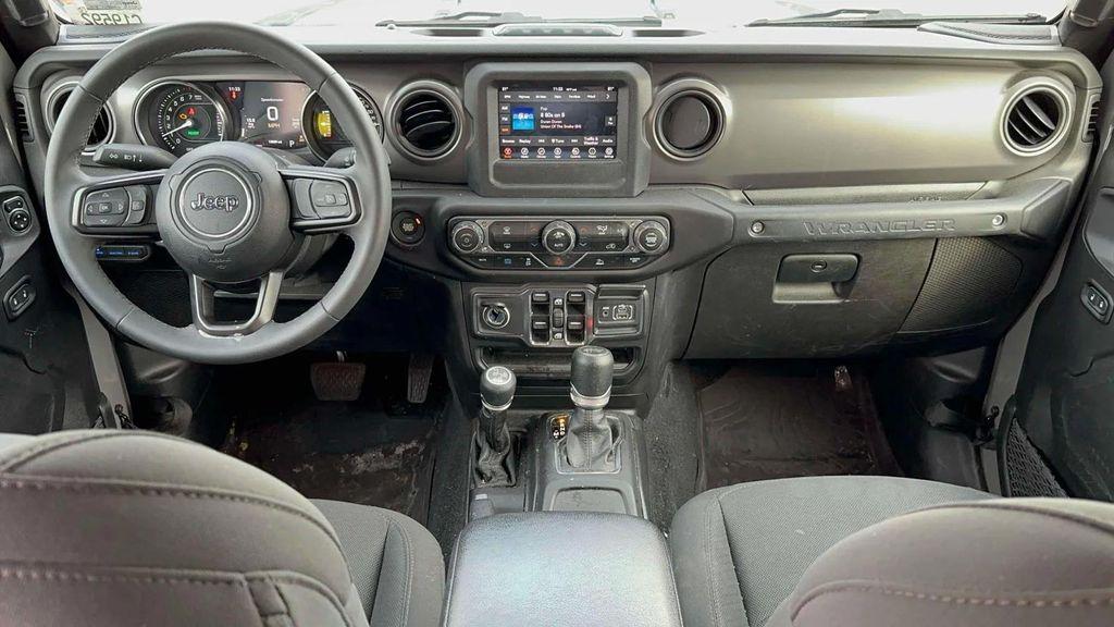 used 2023 Jeep Wrangler 4xe car, priced at $28,991