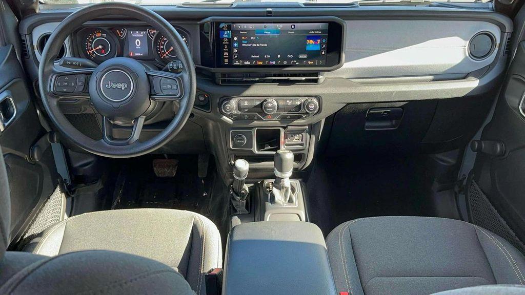 used 2024 Jeep Wrangler car, priced at $29,391