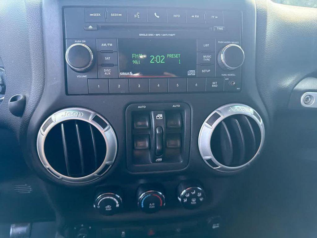 used 2015 Jeep Wrangler Unlimited car, priced at $18,242