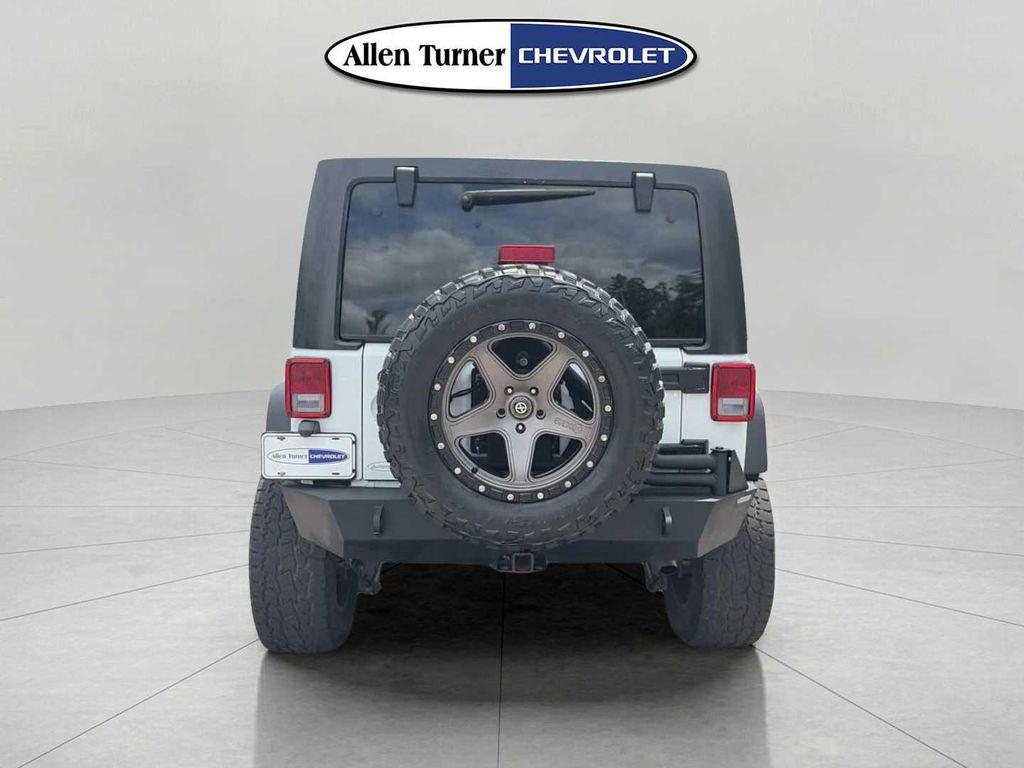 used 2016 Jeep Wrangler Unlimited car, priced at $25,142