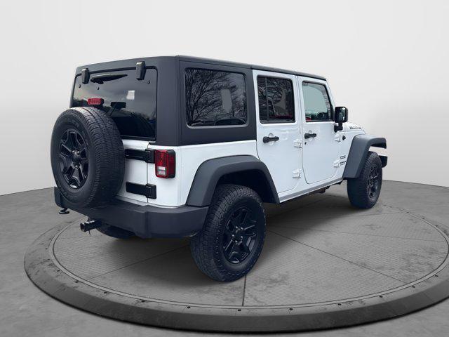 used 2014 Jeep Wrangler Unlimited car, priced at $18,951