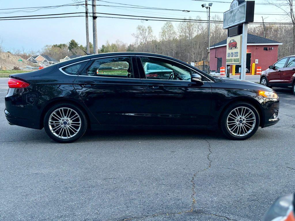 used 2015 Ford Fusion car, priced at $9,495