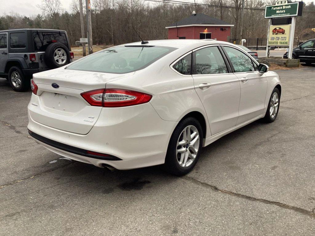 used 2016 Ford Fusion car, priced at $7,990