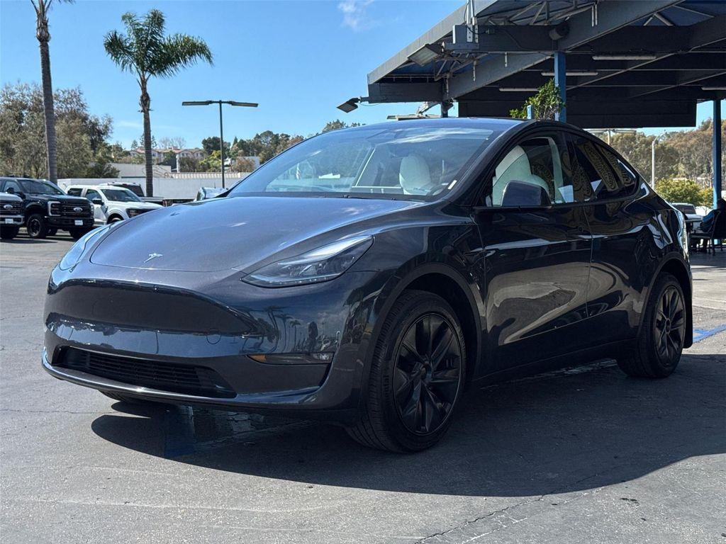 used 2025 Tesla Model Y car, priced at $40,165