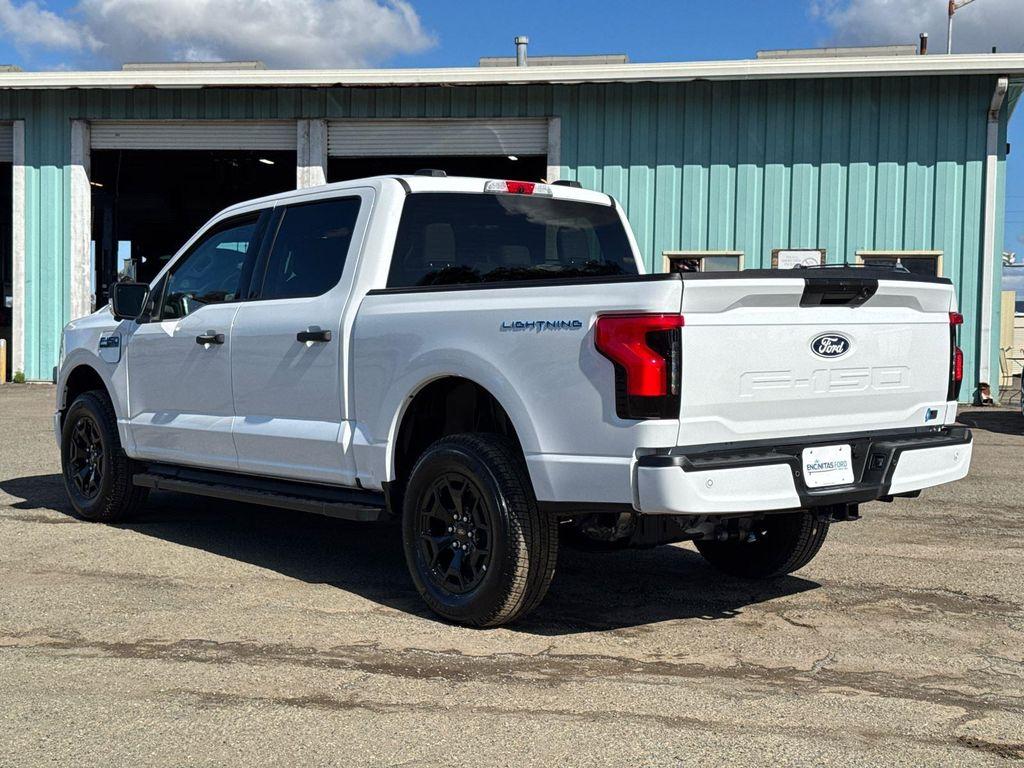 used 2025 Ford F-150 Lightning car, priced at $49,380