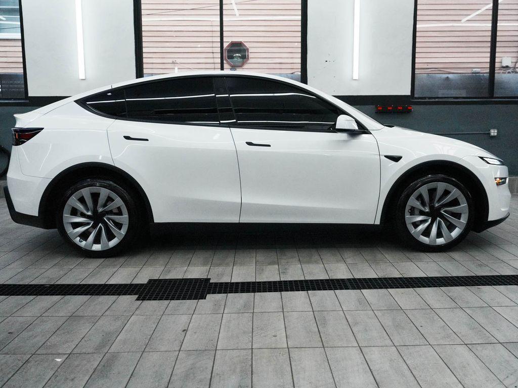 used 2026 Tesla Model Y car, priced at $49,450