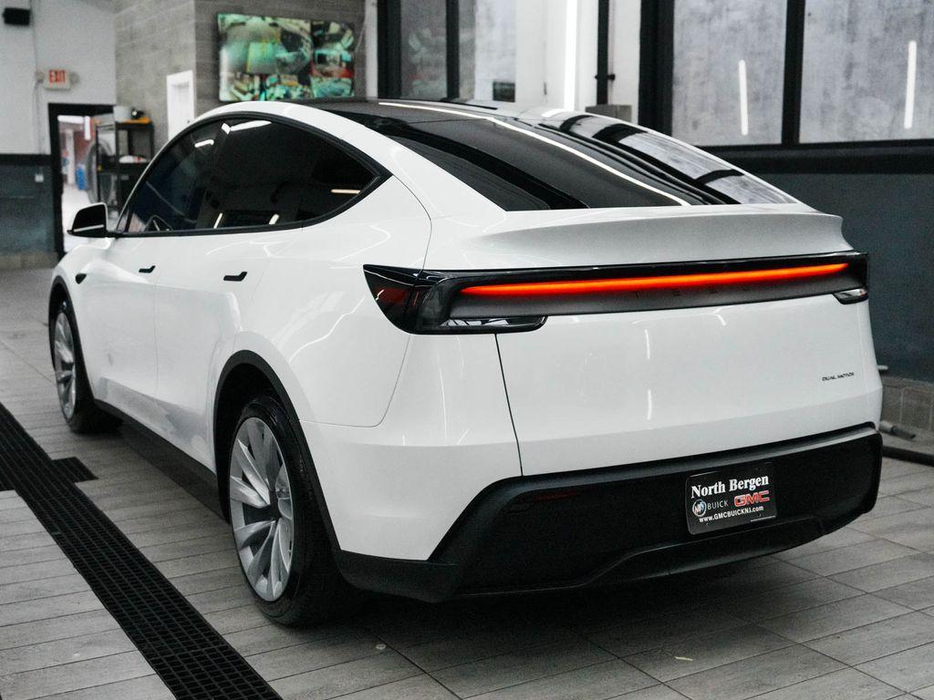 used 2026 Tesla Model Y car, priced at $49,450