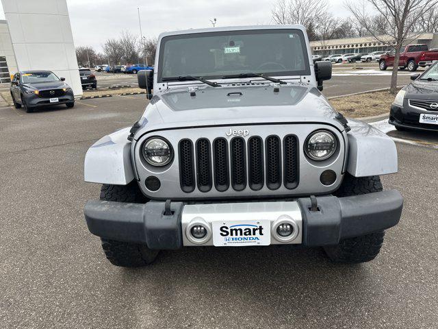 used 2013 Jeep Wrangler Unlimited car, priced at $12,973