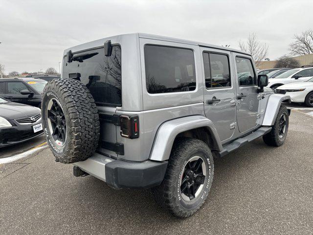 used 2013 Jeep Wrangler Unlimited car, priced at $12,973