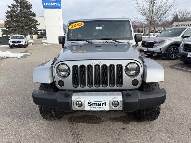 used 2013 Jeep Wrangler Unlimited car, priced at $12,973