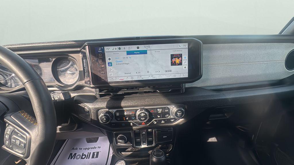 used 2024 Jeep Wrangler 4xe car, priced at $25,900