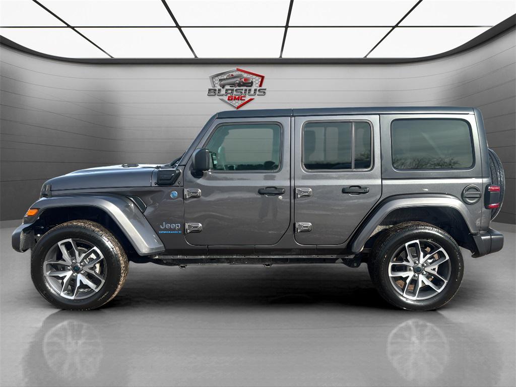 used 2024 Jeep Wrangler 4xe car, priced at $25,999