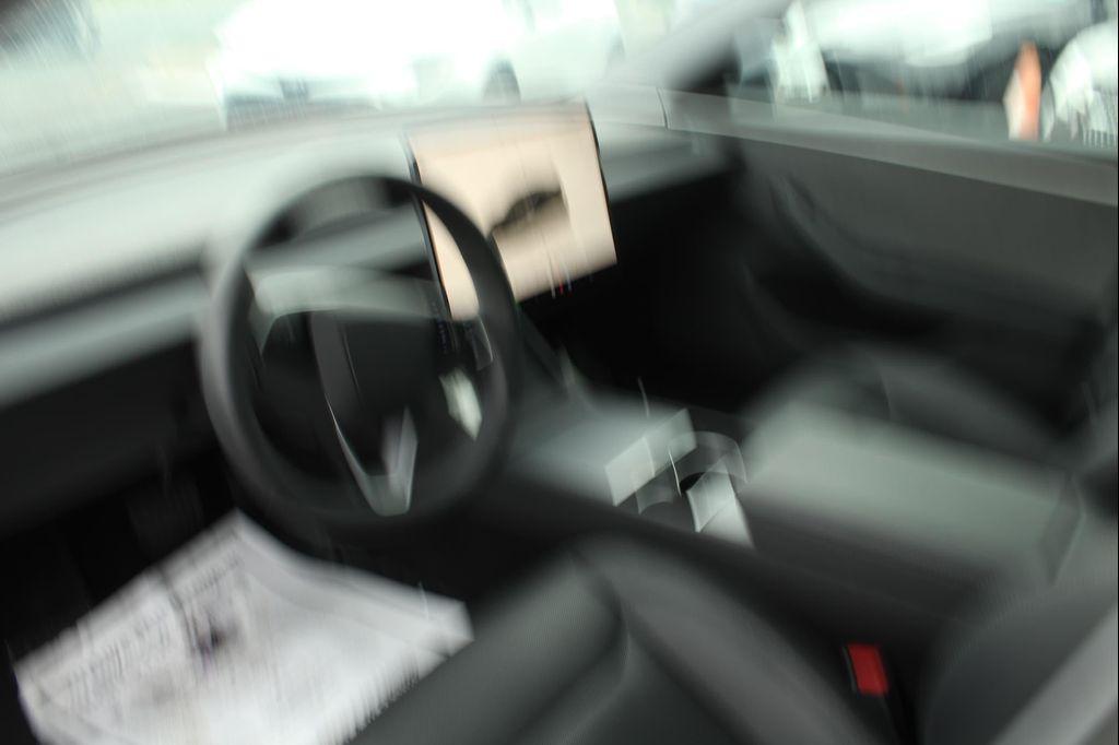 used 2024 Tesla Model 3 car, priced at $33,997