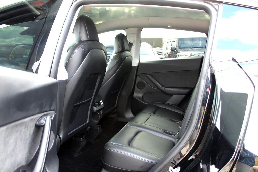 used 2021 Tesla Model Y car, priced at $27,997