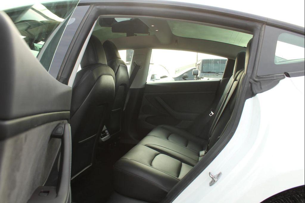 used 2023 Tesla Model 3 car, priced at $20,997