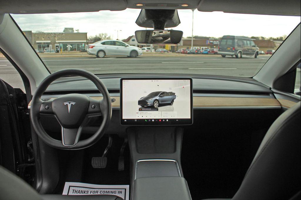 used 2024 Tesla Model Y car, priced at $28,997