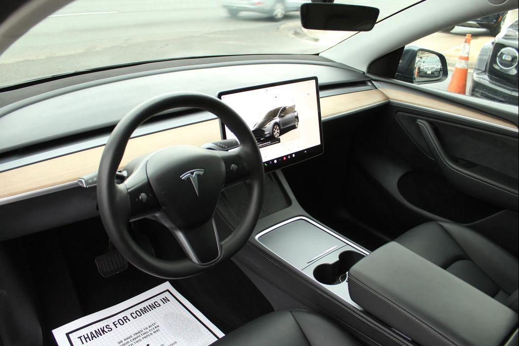 used 2024 Tesla Model Y car, priced at $28,997