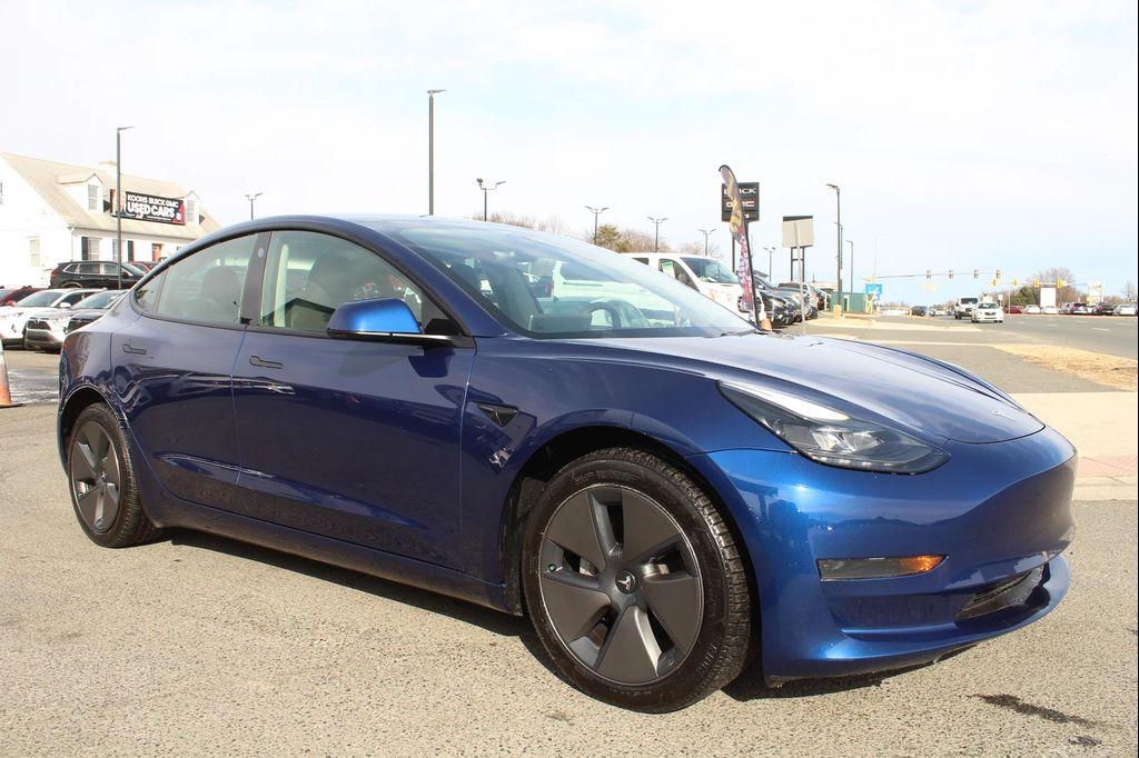 used 2023 Tesla Model 3 car, priced at $20,997