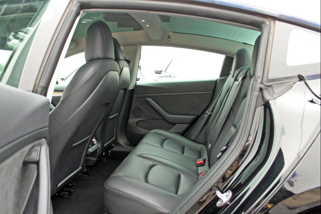 used 2023 Tesla Model 3 car, priced at $32,997