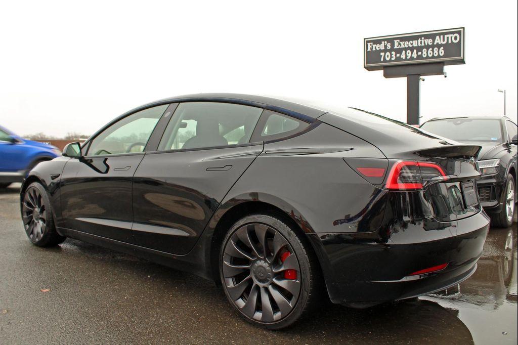 used 2023 Tesla Model 3 car, priced at $32,997