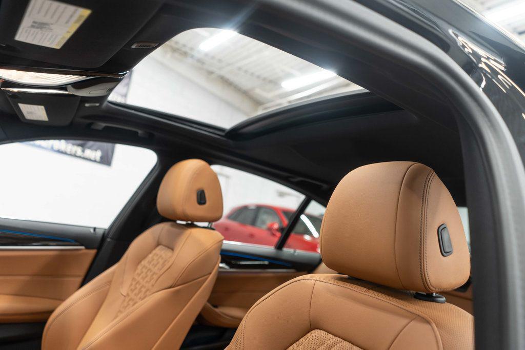 used 2023 BMW 530e car, priced at $37,500