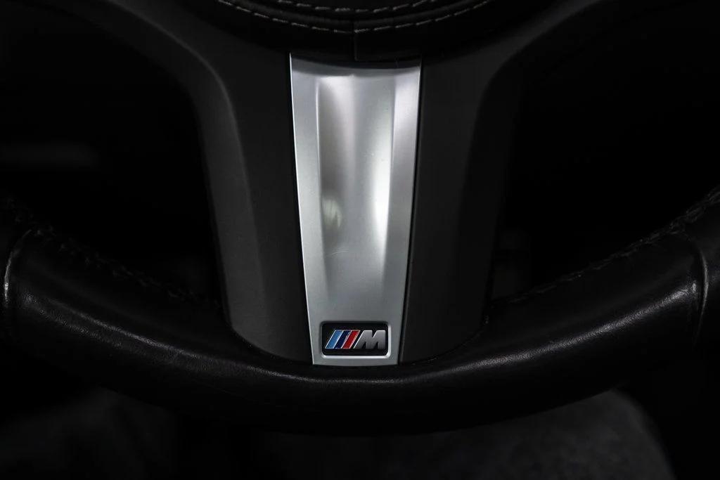 used 2025 BMW X6 car, priced at $59,800