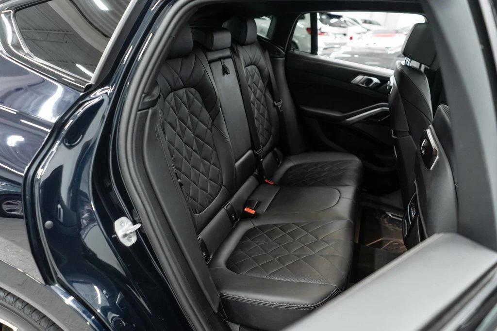 used 2025 BMW X6 car, priced at $59,800