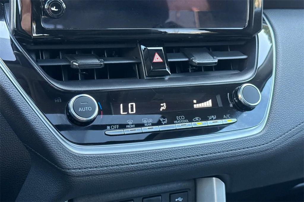 used 2024 Toyota Corolla Cross car, priced at $26,099