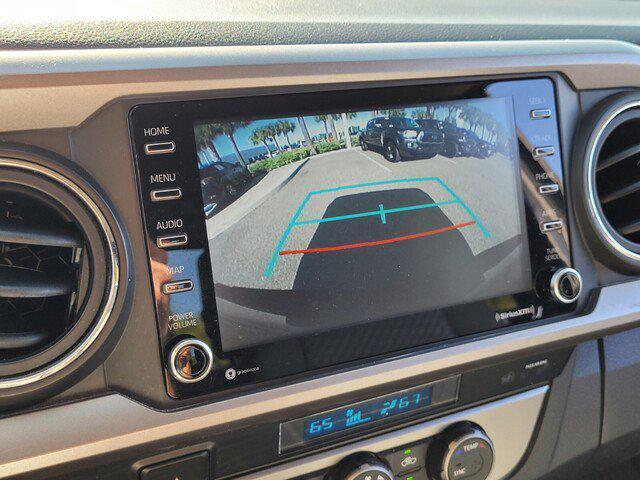 used 2021 Toyota Tacoma car, priced at $25,690