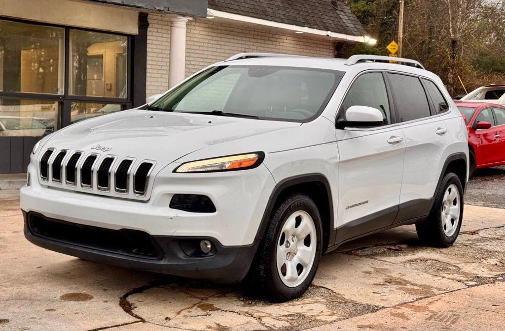 used 2014 Jeep Cherokee car, priced at $7,990