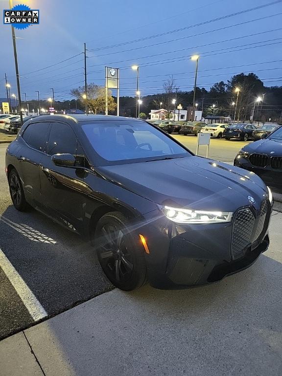 used 2024 BMW iX car, priced at $49,998