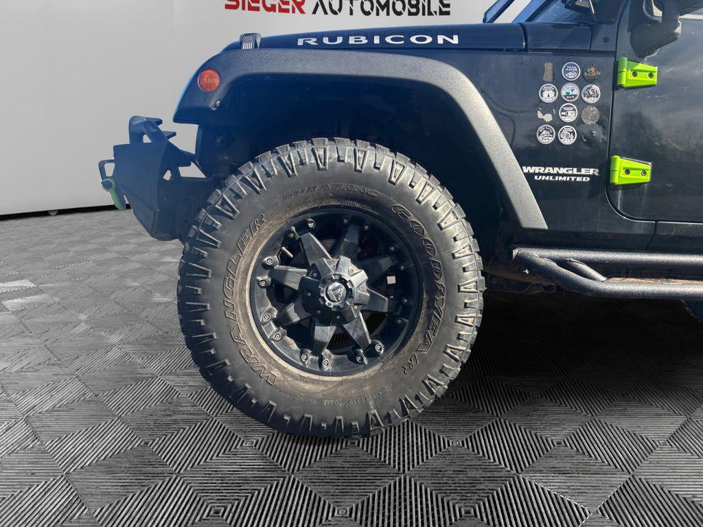 used 2014 Jeep Wrangler Unlimited car, priced at $16,849