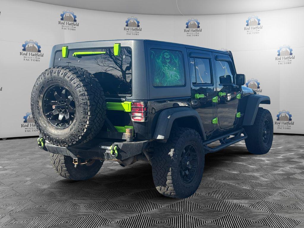 used 2014 Jeep Wrangler Unlimited car, priced at $16,849