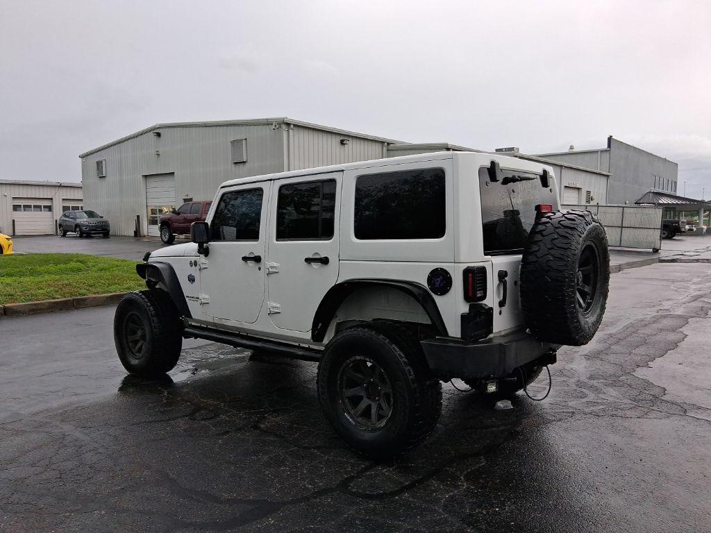 used 2012 Jeep Wrangler Unlimited car, priced at $13,990