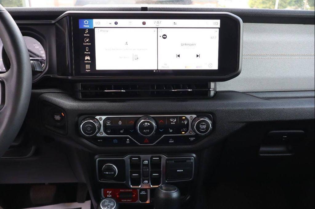 used 2024 Jeep Wrangler 4xe car, priced at $27,990
