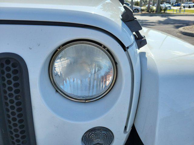 used 2014 Jeep Wrangler Unlimited car, priced at $15,382