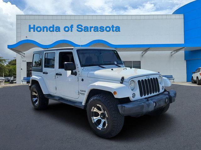 used 2014 Jeep Wrangler Unlimited car, priced at $15,382