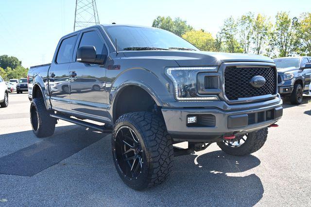 used 2018 Ford F-150 car, priced at $33,488