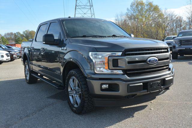 used 2018 Ford F-150 car, priced at $29,280