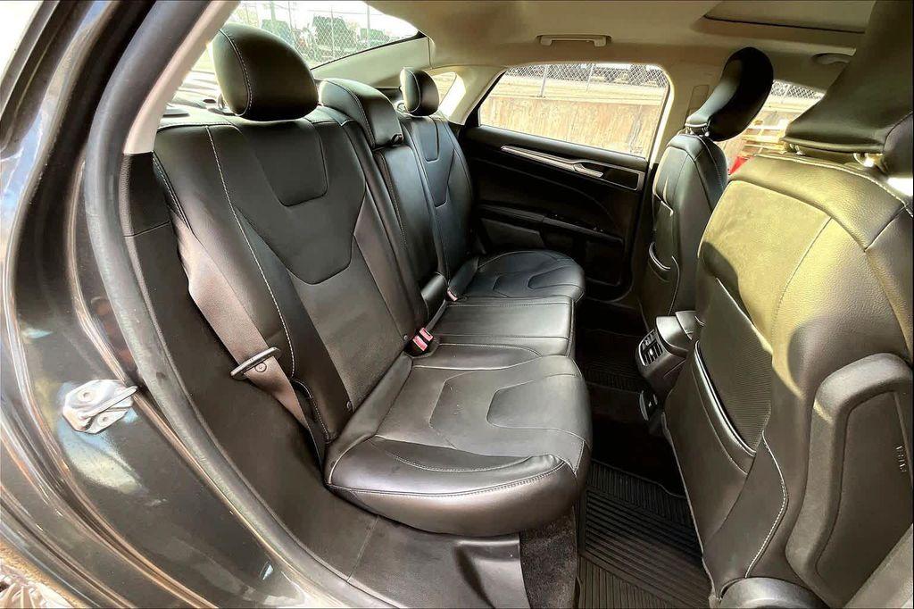 used 2015 Ford Fusion car, priced at $10,971