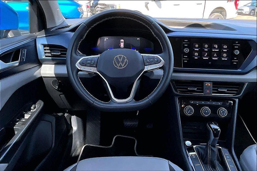 used 2023 Volkswagen Taos car, priced at $21,971