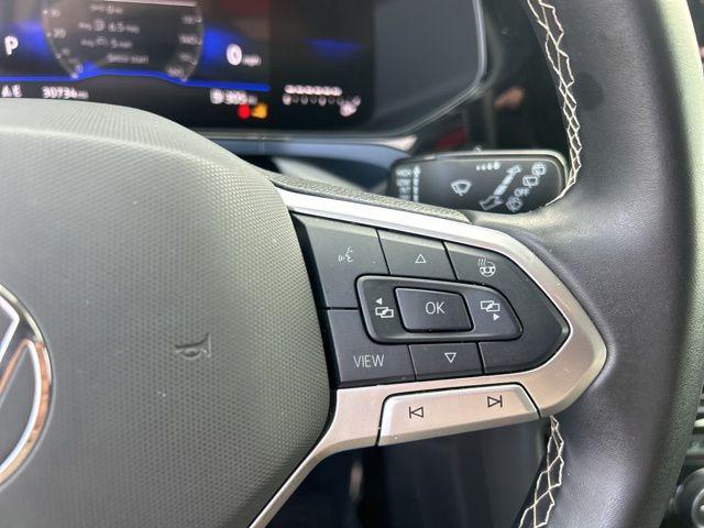 used 2024 Volkswagen Taos car, priced at $20,223