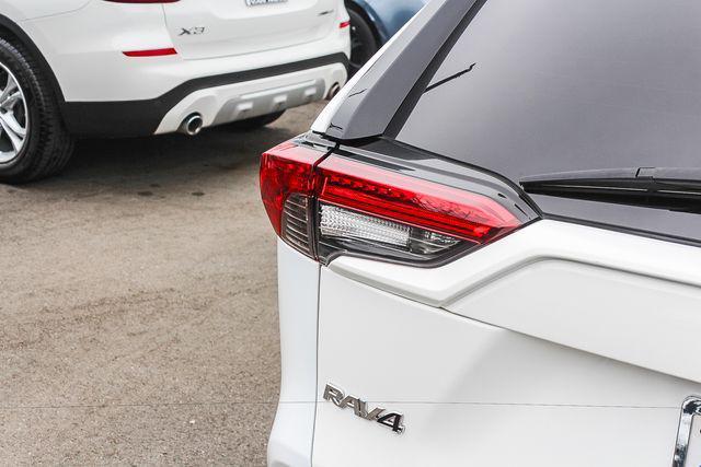 used 2023 Toyota RAV4 Hybrid car, priced at $26,976