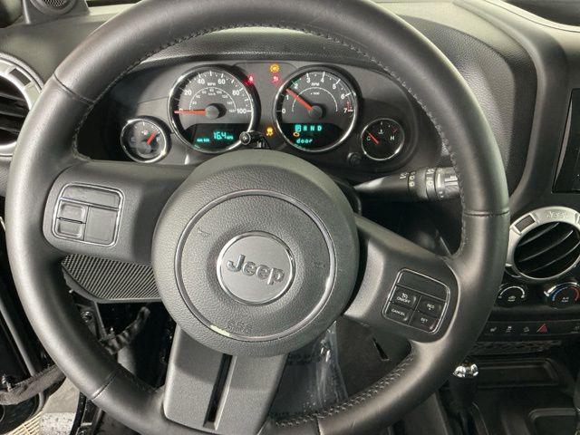 used 2014 Jeep Wrangler Unlimited car, priced at $10,171