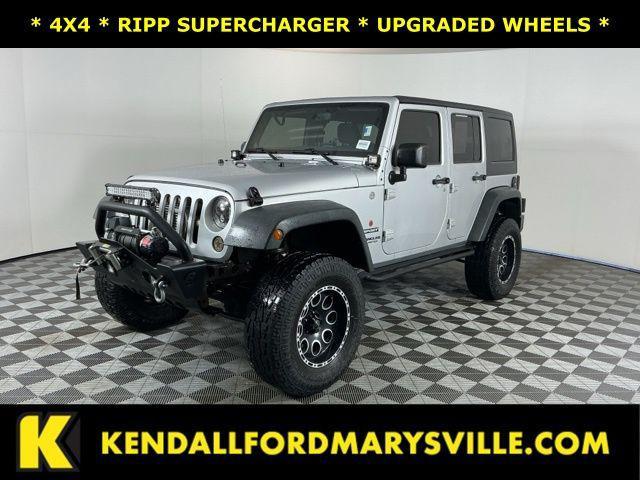 used 2011 Jeep Wrangler Unlimited car, priced at $15,971