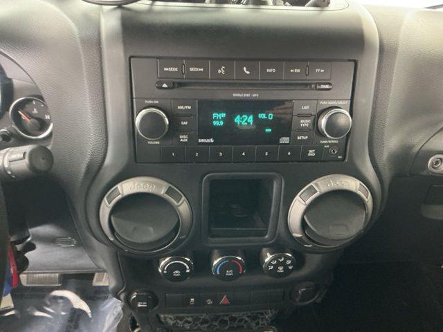 used 2011 Jeep Wrangler Unlimited car, priced at $15,971