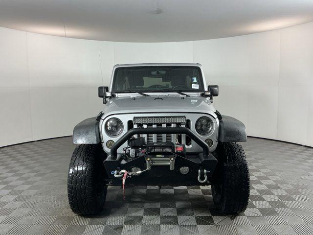 used 2011 Jeep Wrangler Unlimited car, priced at $15,971