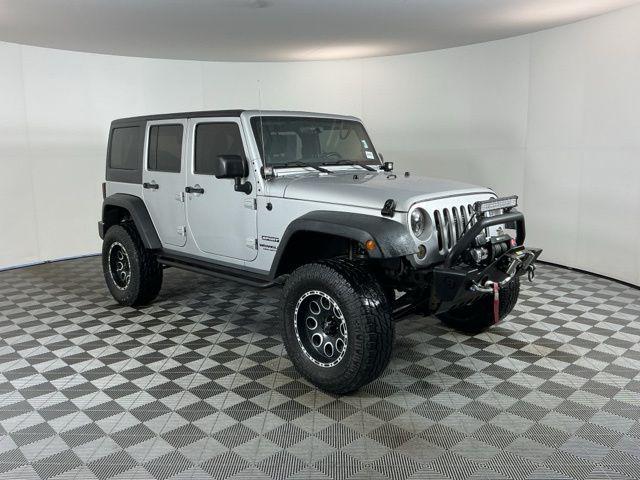 used 2011 Jeep Wrangler Unlimited car, priced at $15,971