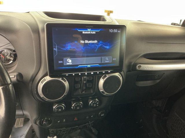 used 2012 Jeep Wrangler Unlimited car, priced at $20,171
