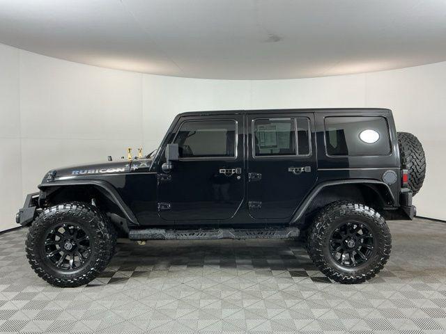used 2012 Jeep Wrangler Unlimited car, priced at $20,171